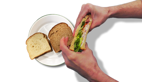 Squeezing the bread gives sensory feedback of softness which correlates to desired experience